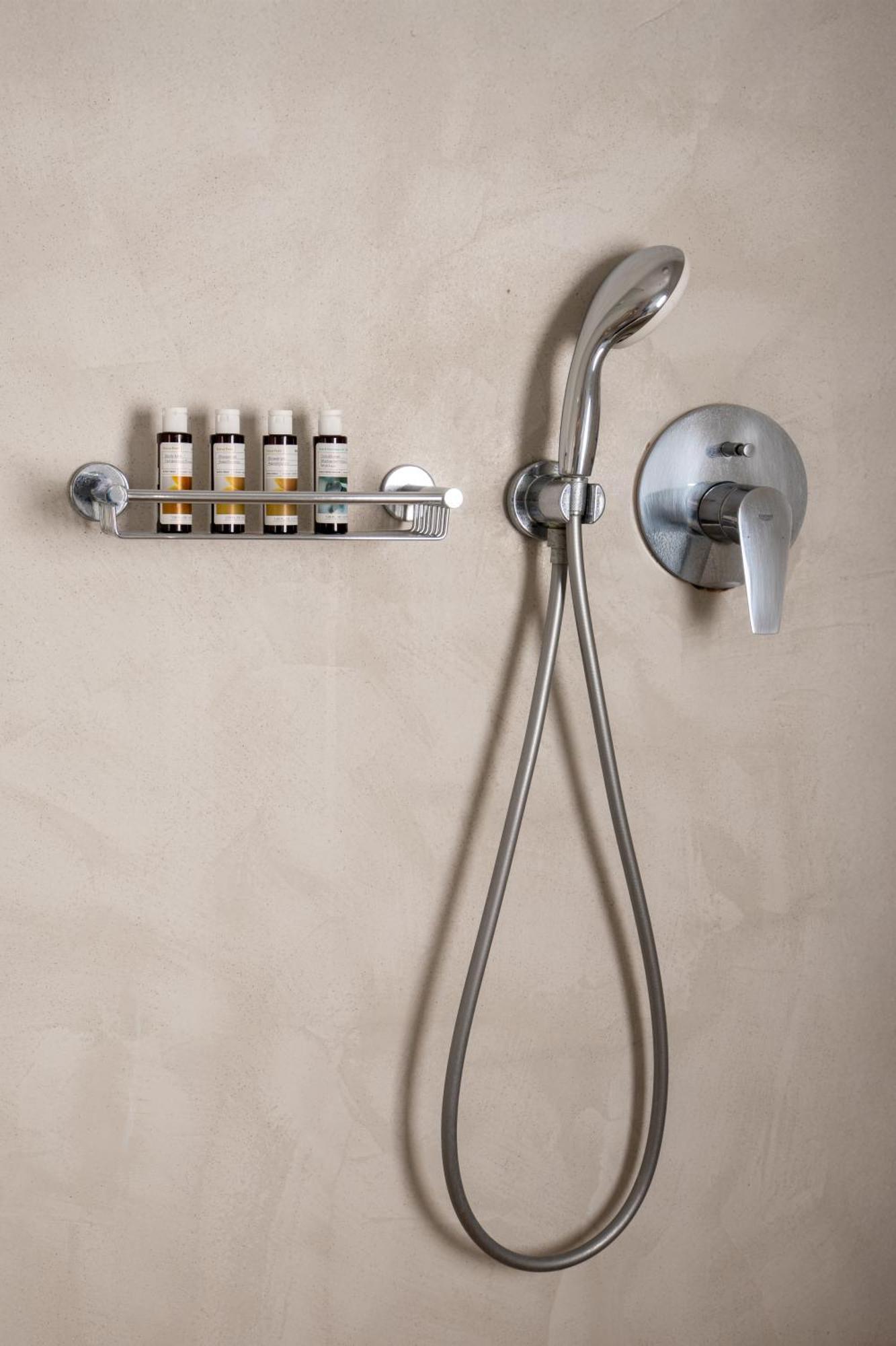Santorini Kastelli Resort Kamári Dış mekan fotoğraf A shower mixer